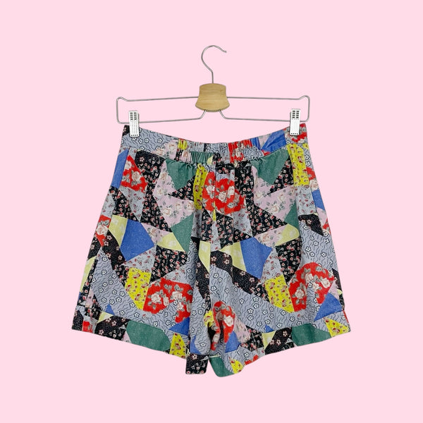 COREY LYNN CALTER FLORAL PATCHWORK SHORTS (M)