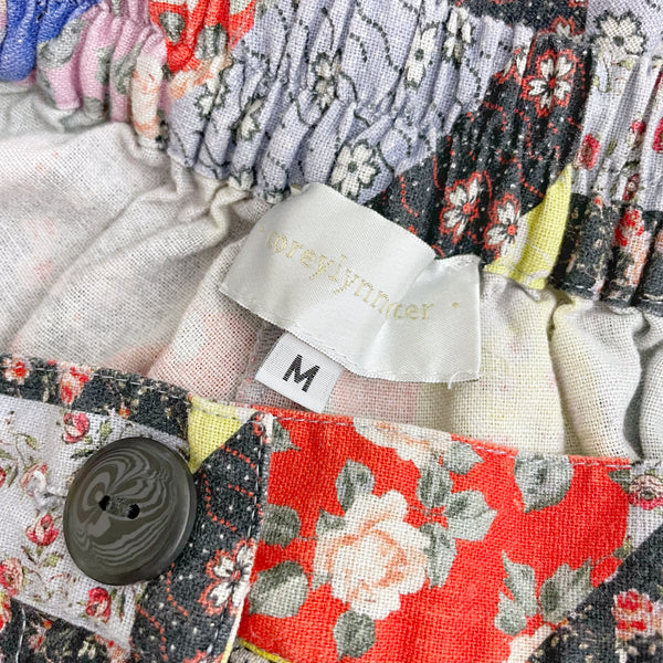 COREY LYNN CALTER FLORAL PATCHWORK SHORTS (M)