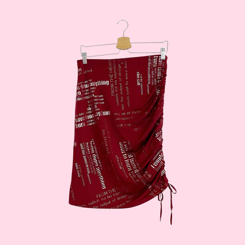 BURGUNDY WORD PRINT ASYMMETRICAL MIDI SKIRT (M/L)
