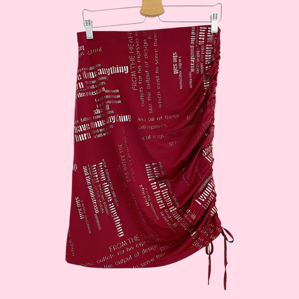 BURGUNDY WORD PRINT ASYMMETRICAL MIDI SKIRT (M/L)
